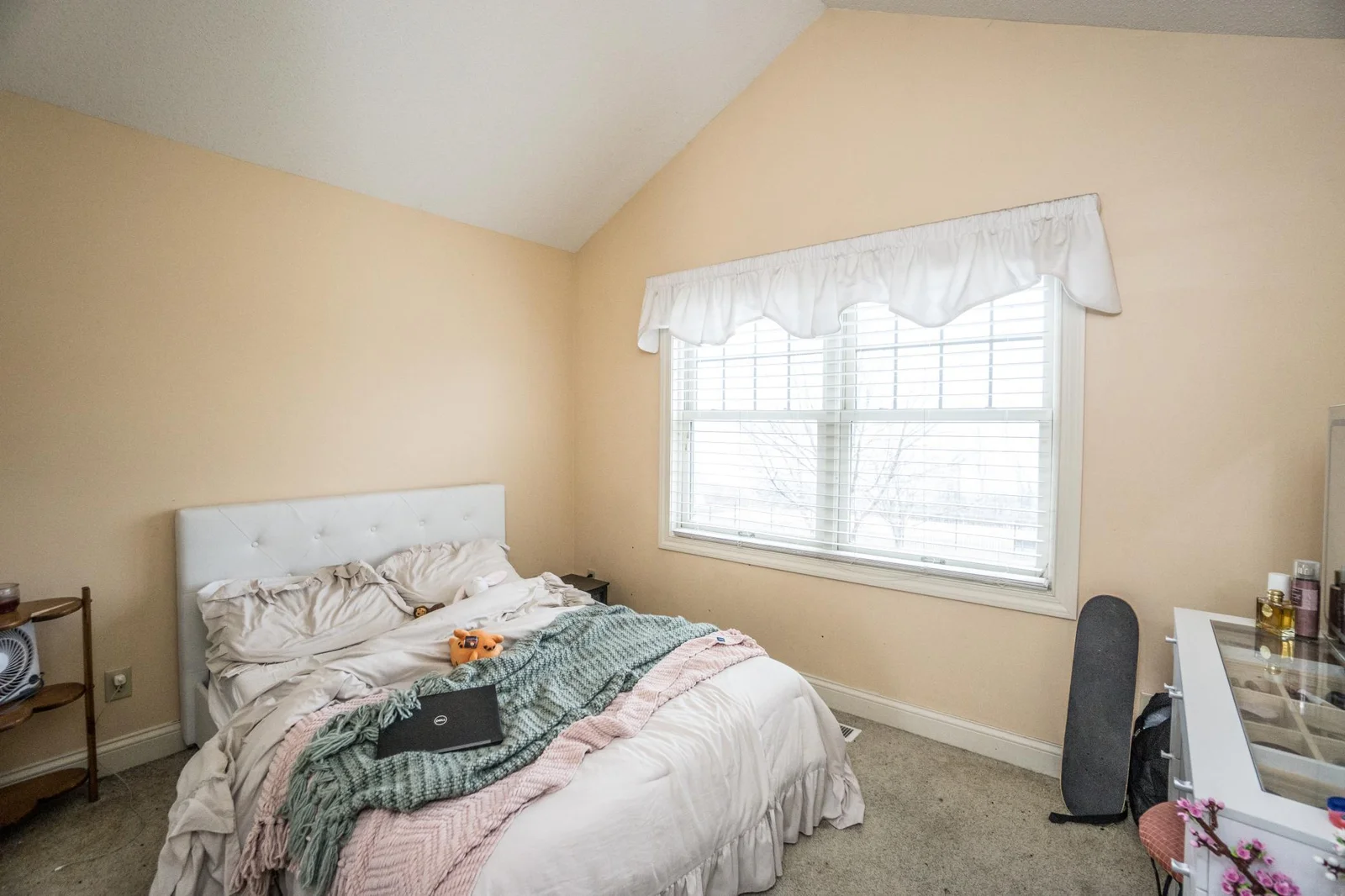 Bedroom 1 of 4 ihas a vaulted ceiling,