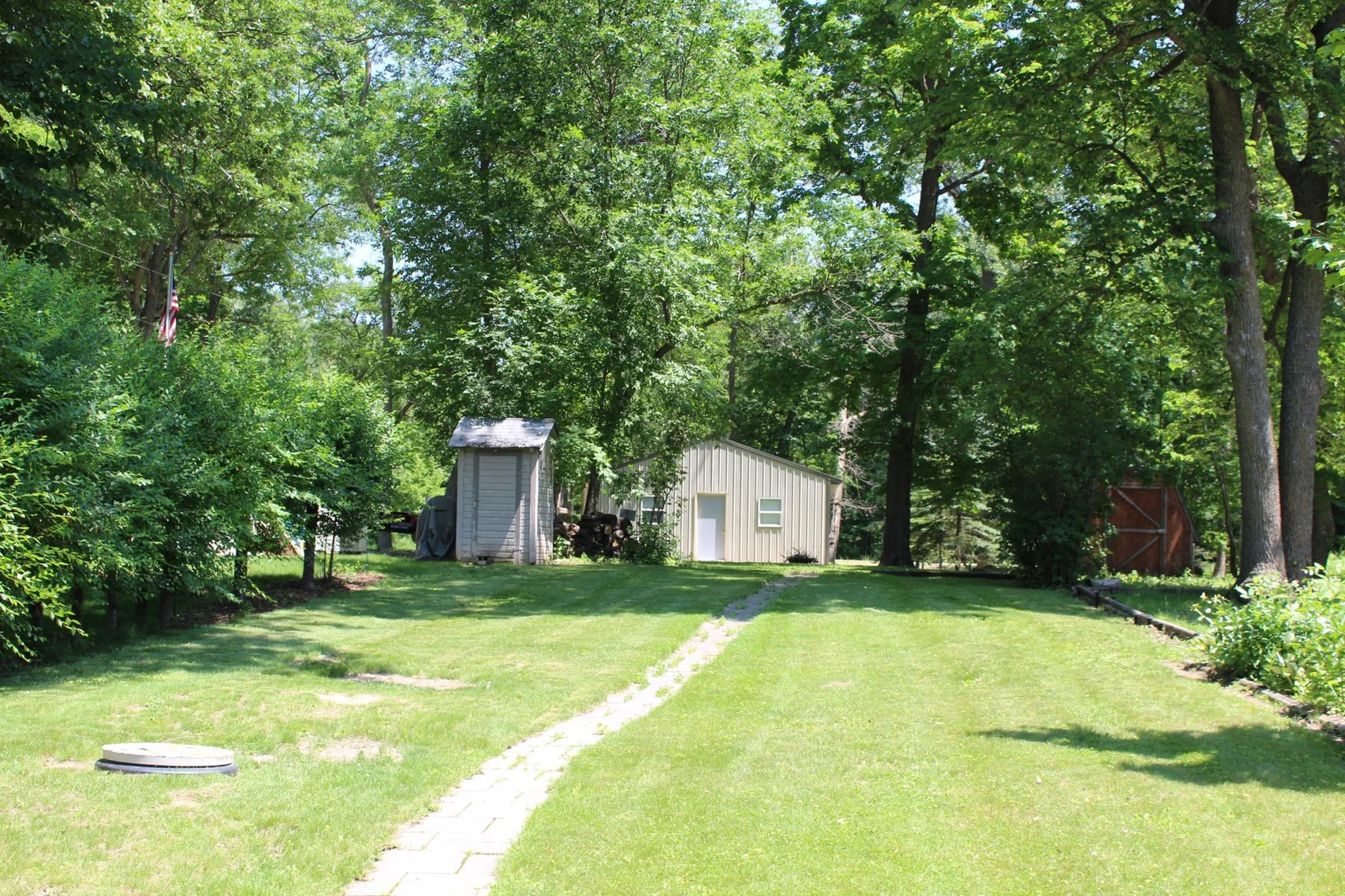 Large yard going back to the garage/bunkhouse