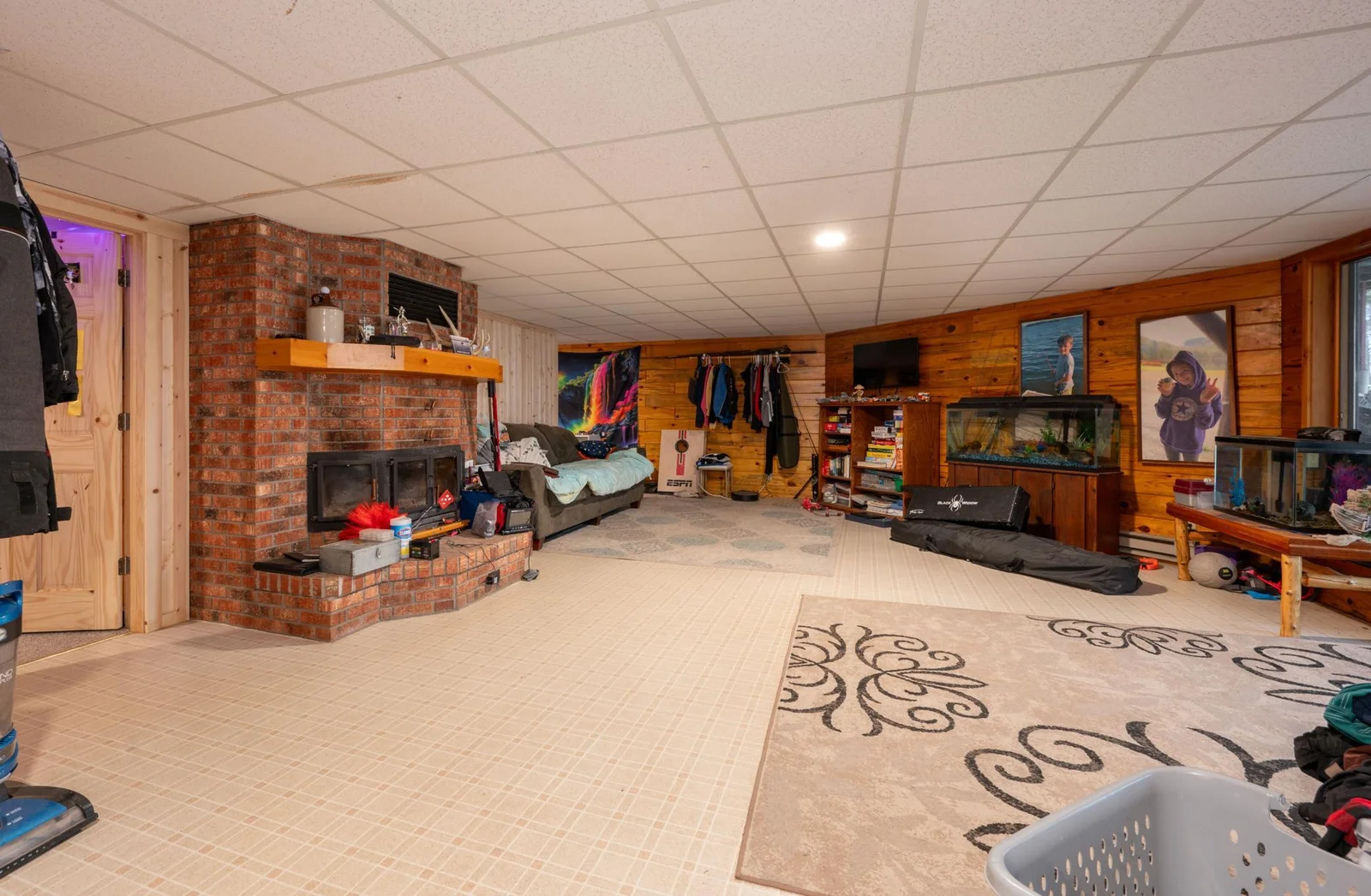 Lower-Level Family Room with Masonry Fireplace