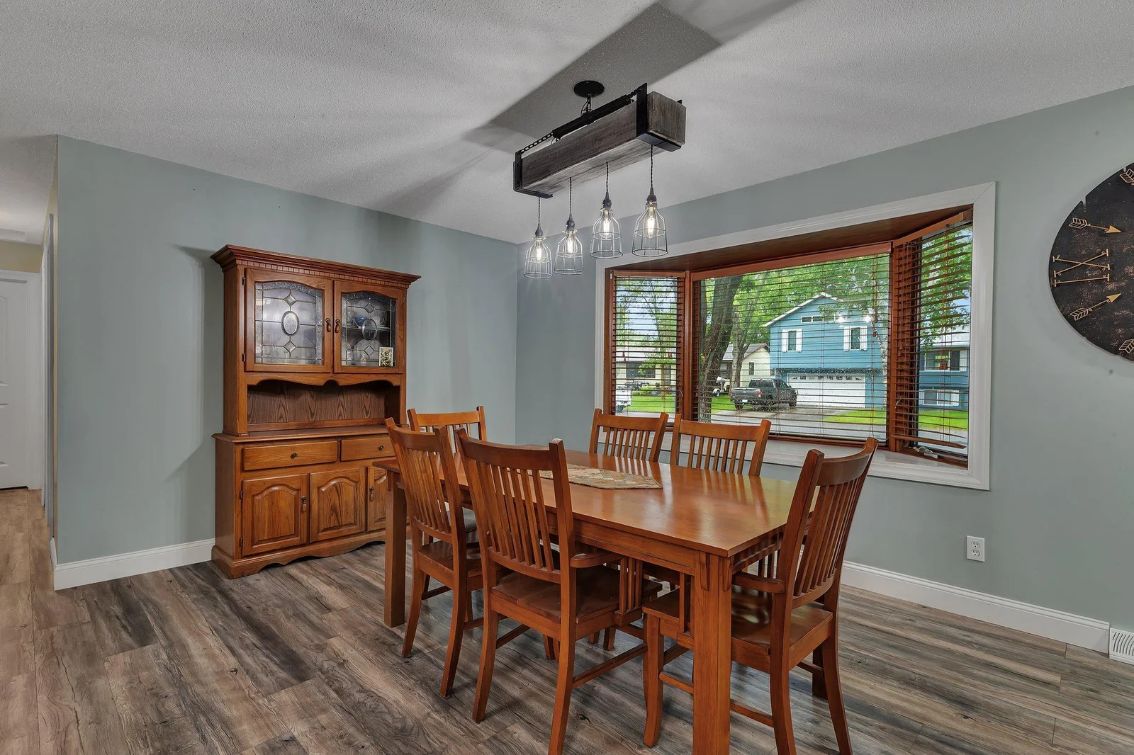 Dining area overlooks front yard.