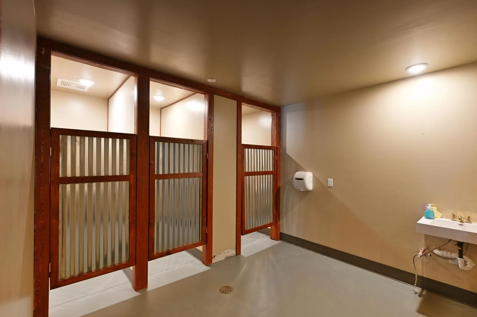 The women’s bathroom has 3 stalls and is freshly painted and ready for your decorating ideas.