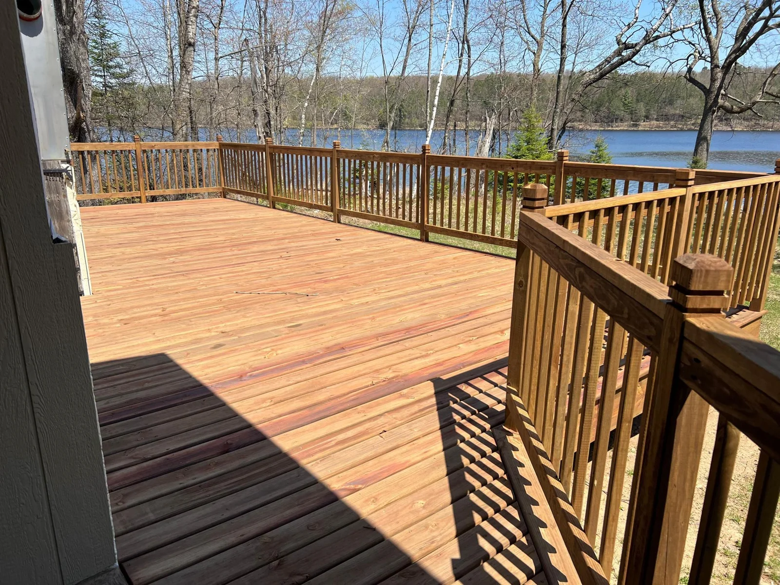 The new deck is the perfect place for a glass of wine and to enjoy scenic lake views!