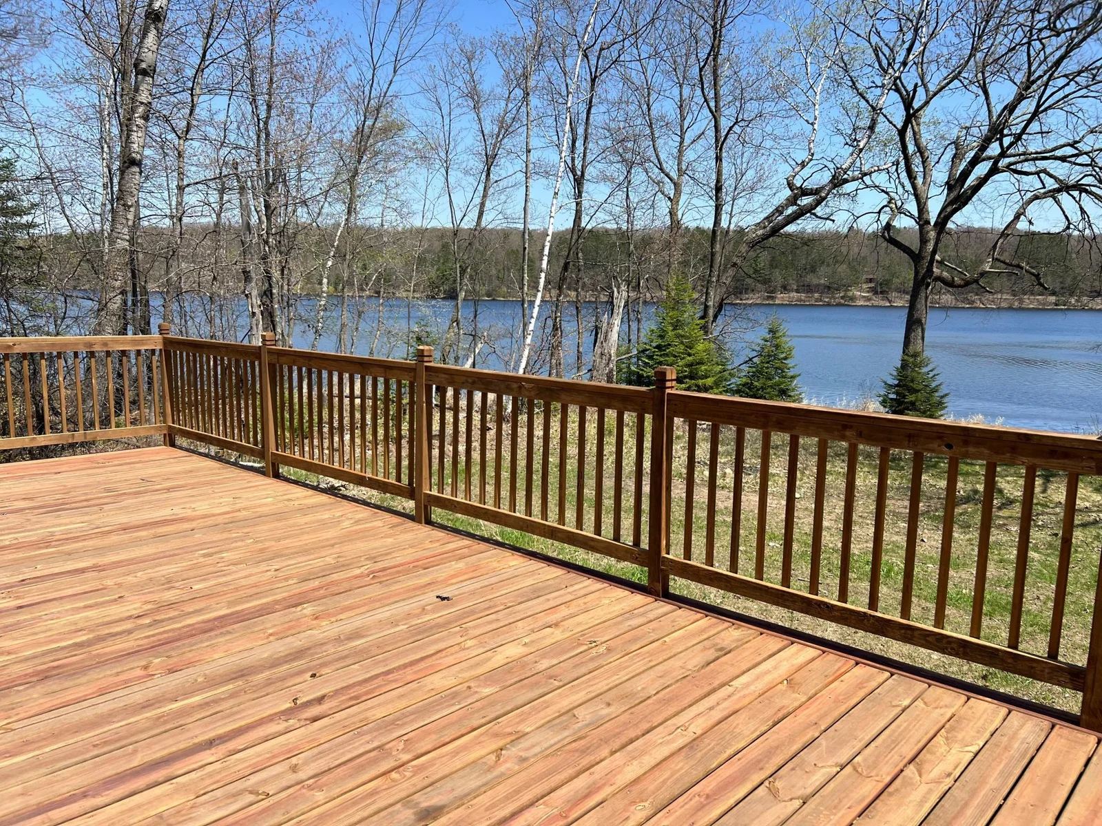 The deck is another perfect space to enjoy, picture a group of friends relaxing after a full day on the lake or after enjoying all Hayward has to offer.