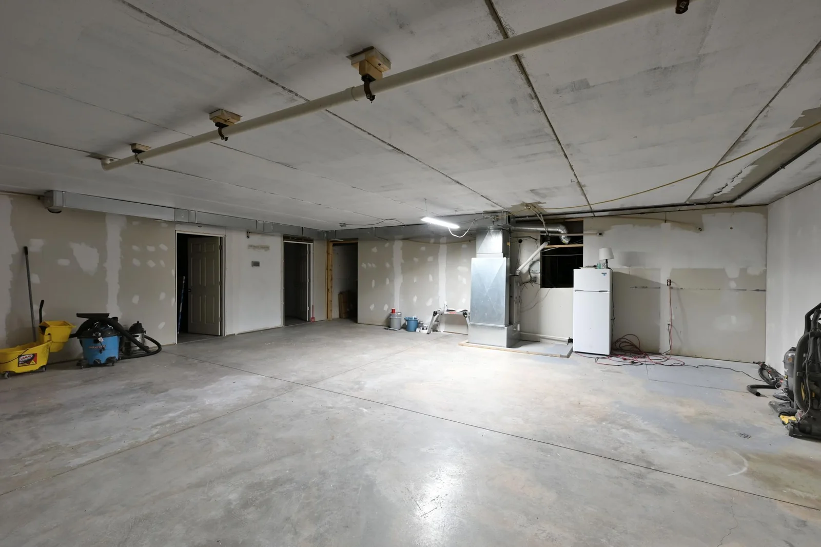 The lower level has a ton of potential, it has an office area already walled off, bathroom and a large open area that is perfect for storage or even a break room for employees or green room for live entertainment.
