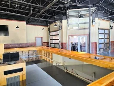 The area behind the bar is very spacious, allowing space for staff to operate and ample room for nearly any equipment needs.