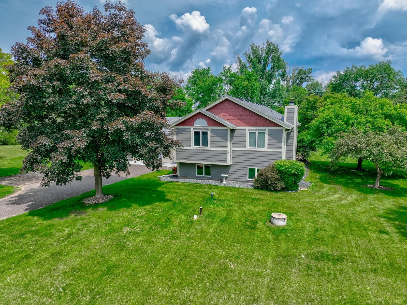 A recently updated roof, Everlasting composite siding, LeafGuard gutters, a 2-car attached garage, and a generous garden shed make for easy, low-maintenance living. There’s even a mature apple tree that produces fruit.