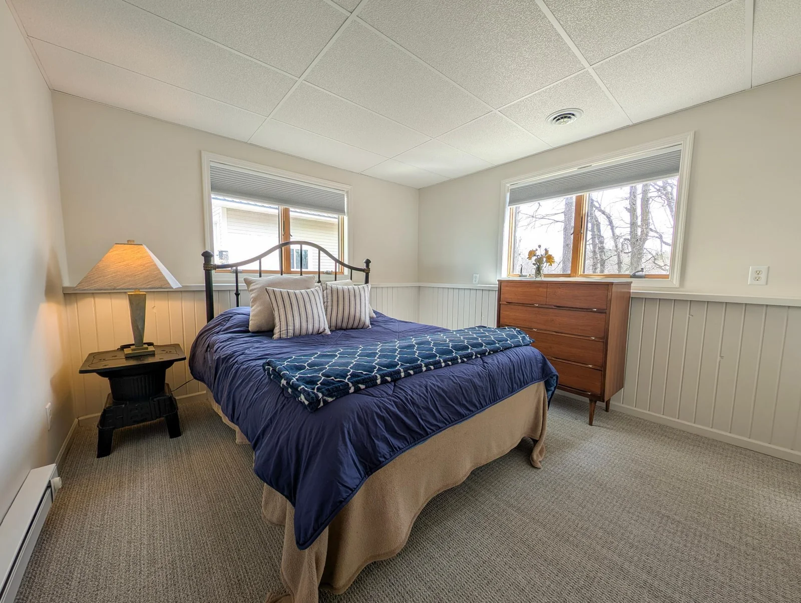 Private lower-level bedroom with plenty of space and comfort for guests.