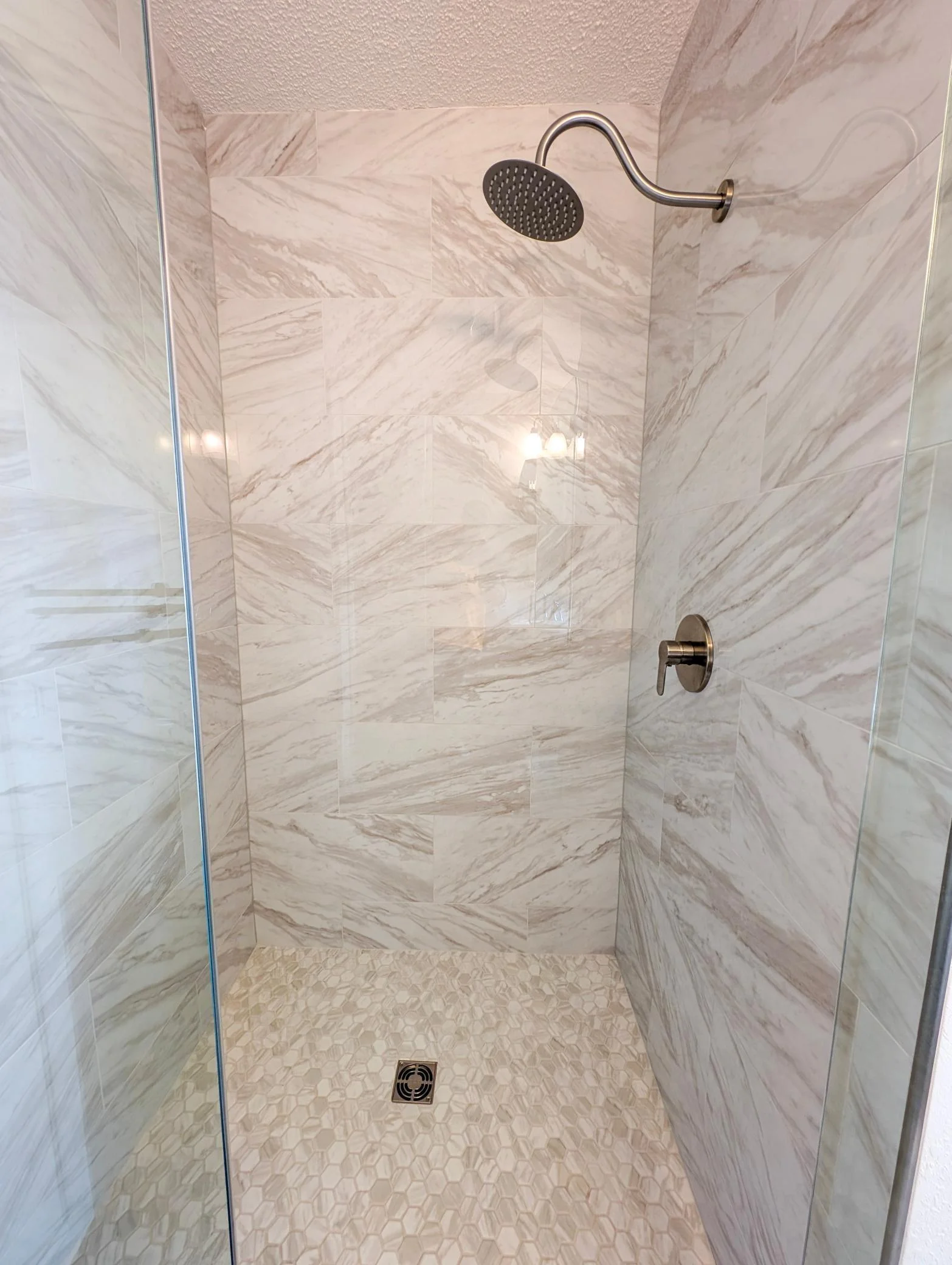 Beautifully updated main-level bathroom with clean finishes and practical design.