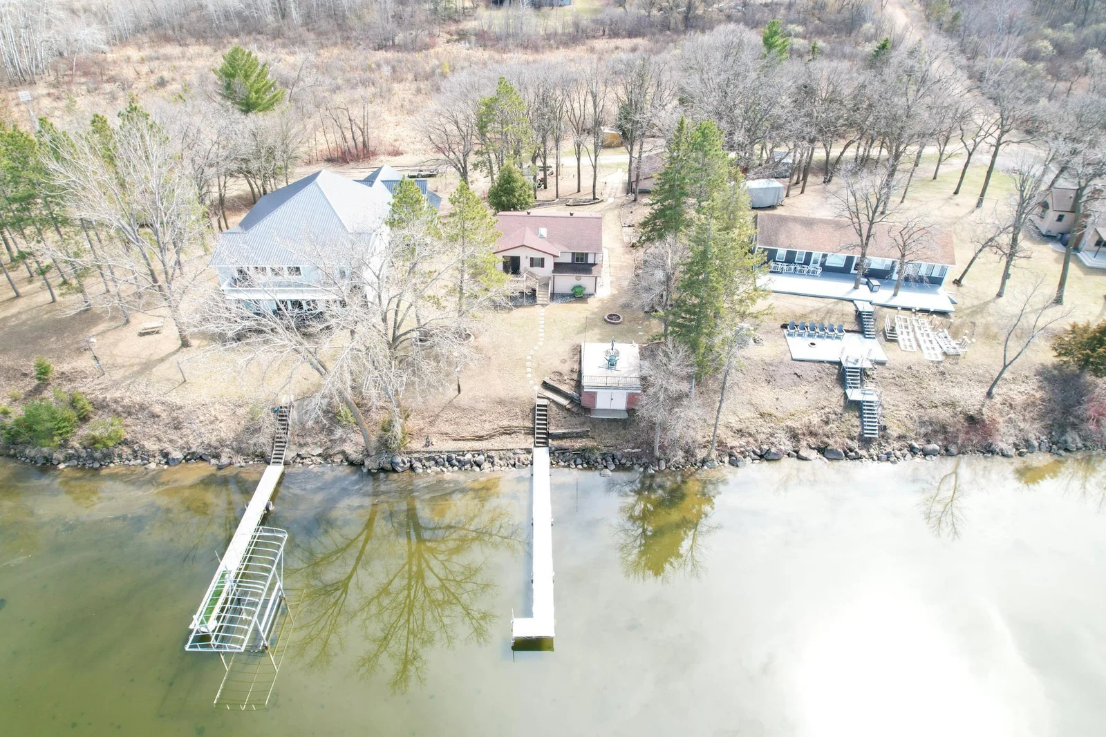 Peaceful lake country setting with mature trees. (early Spring photo).