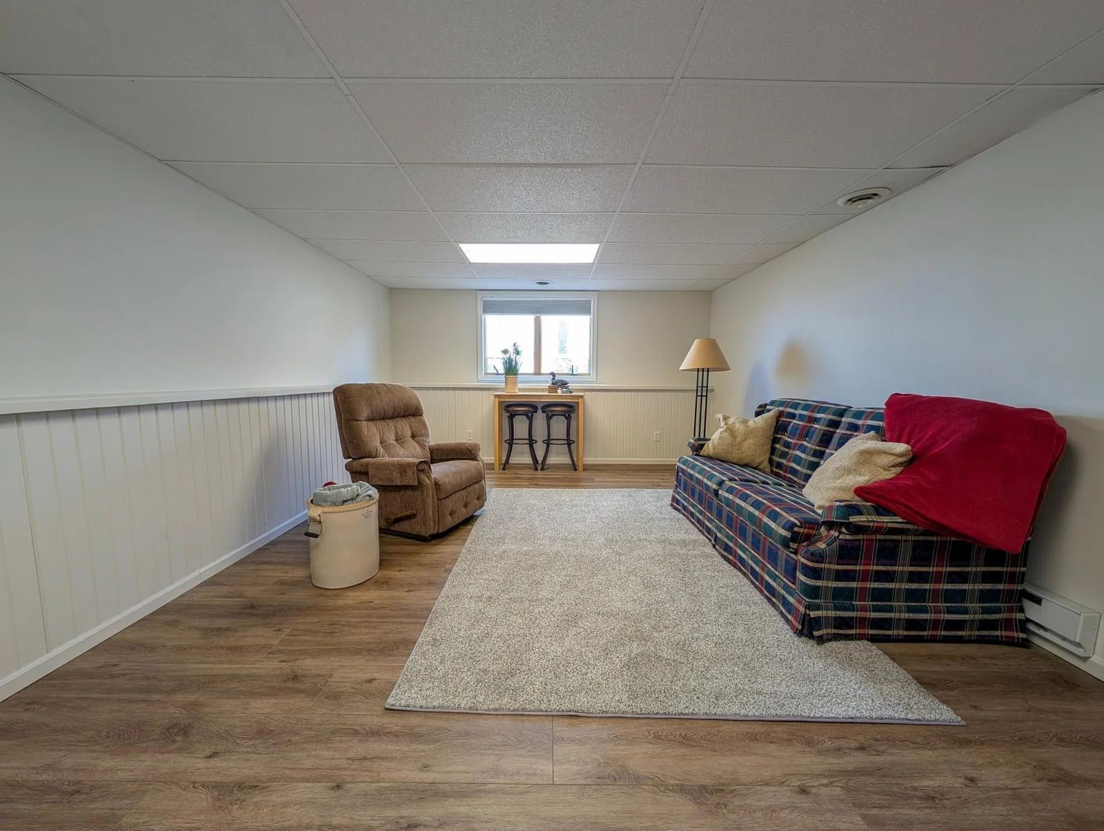 Comfort meets functionality with the lower-level living space, with room to relax after a day on the lake.