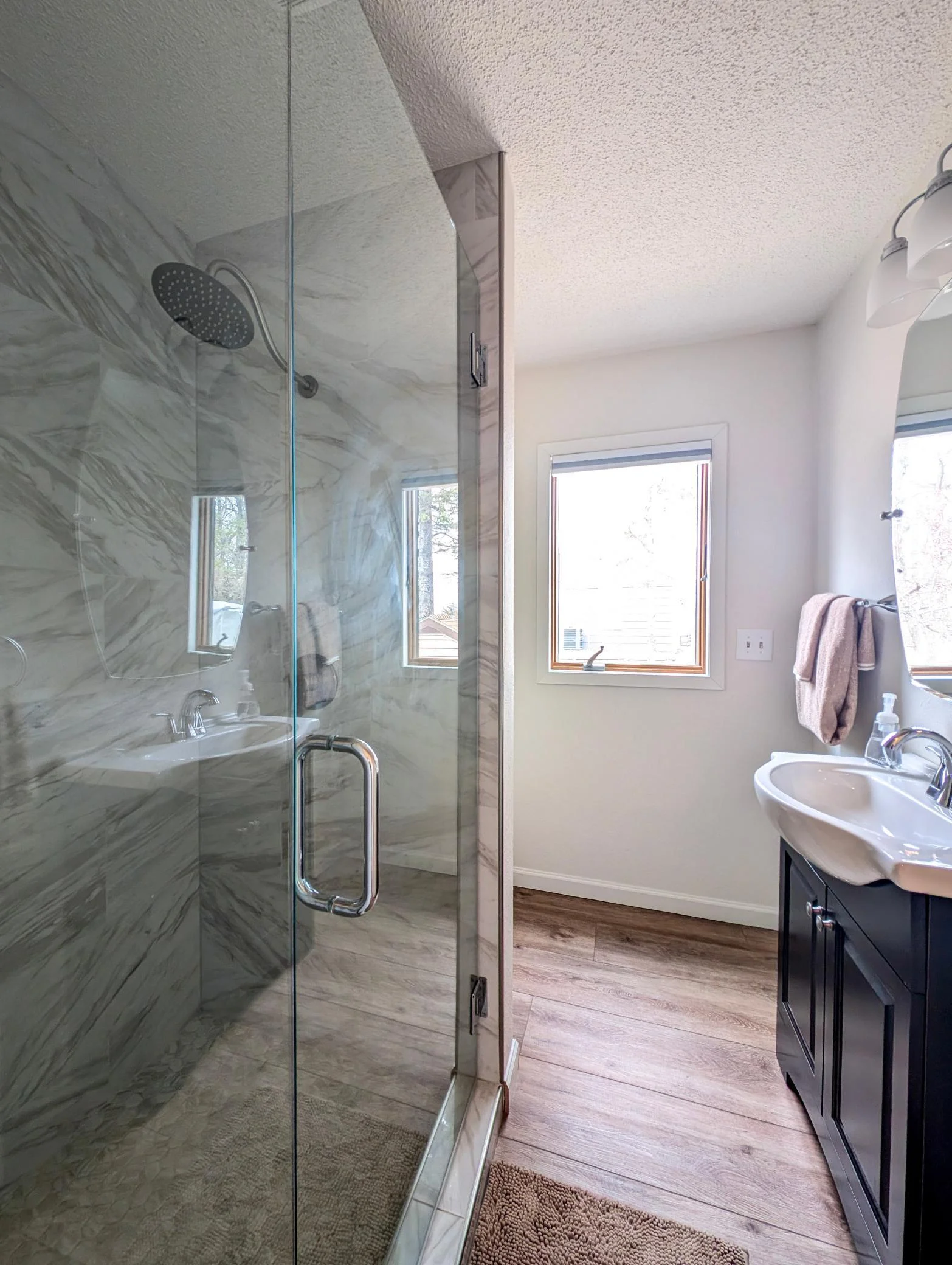 Beautifully updated main-level bathroom with clean finishes and practical design.