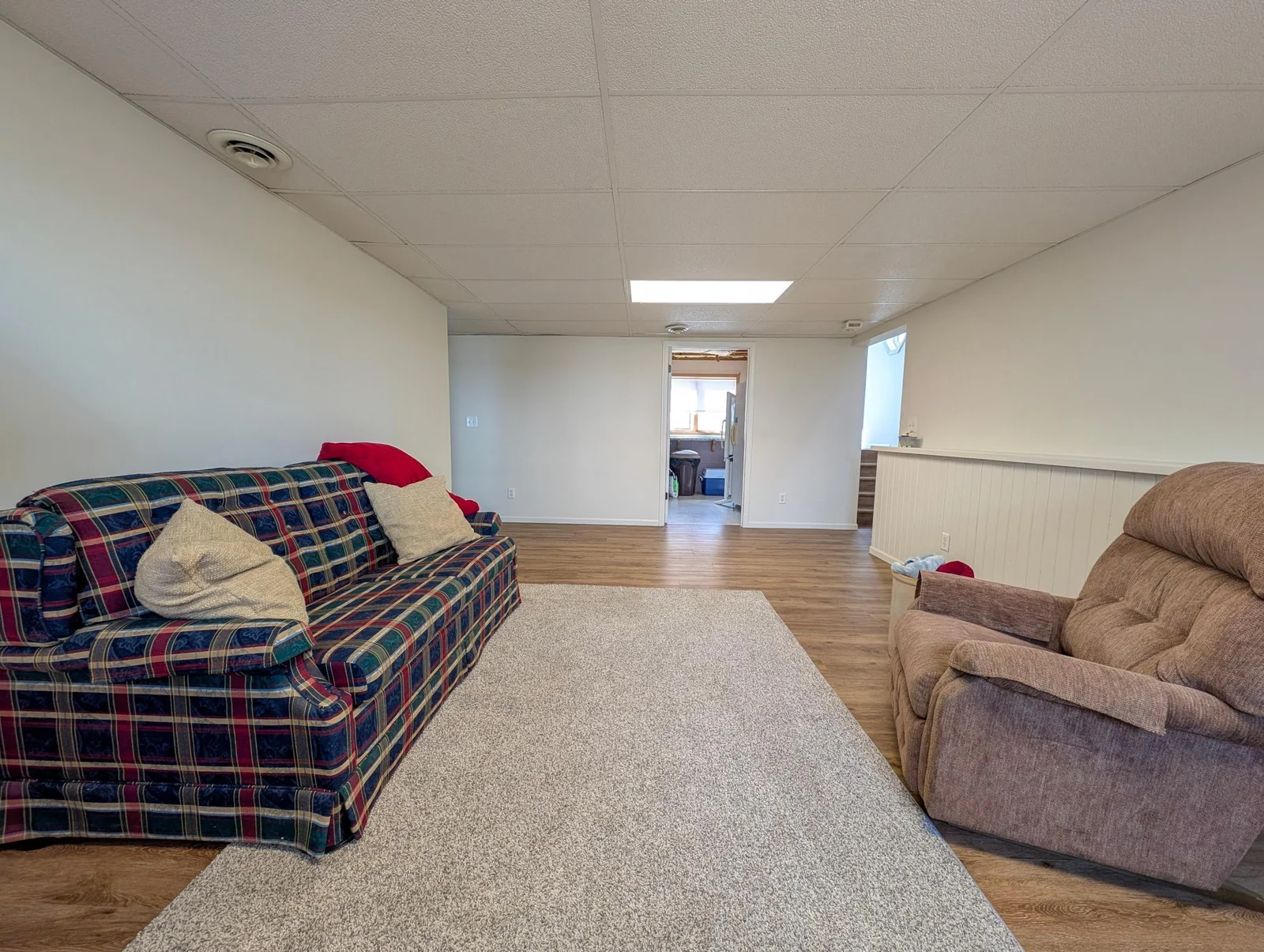 Comfort meets functionality with the lower-level living space, with room to relax after a day on the lake.