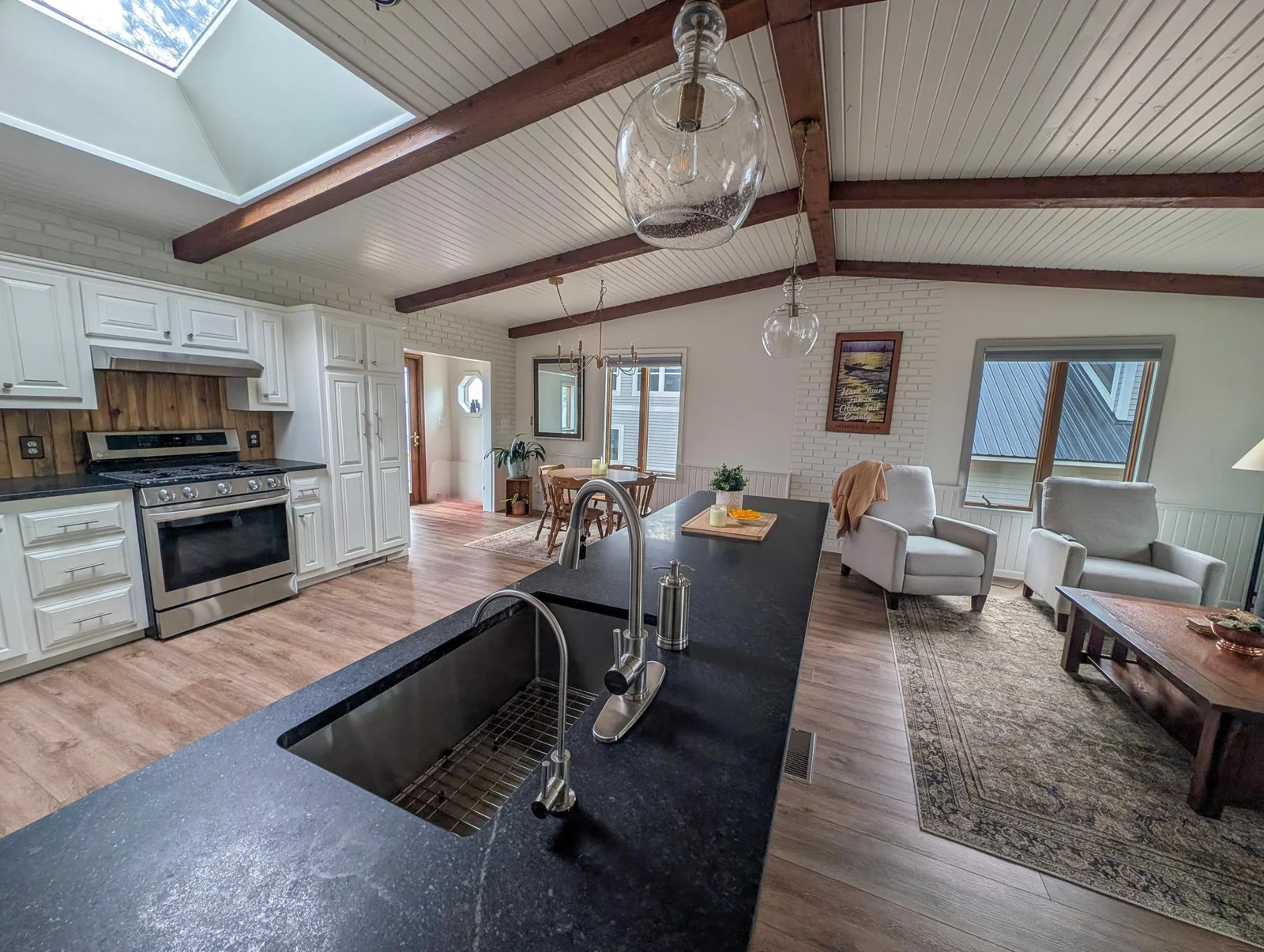 The heart of the home: a chef-inspired kitchen that seamlessly connects to living and dining areas.