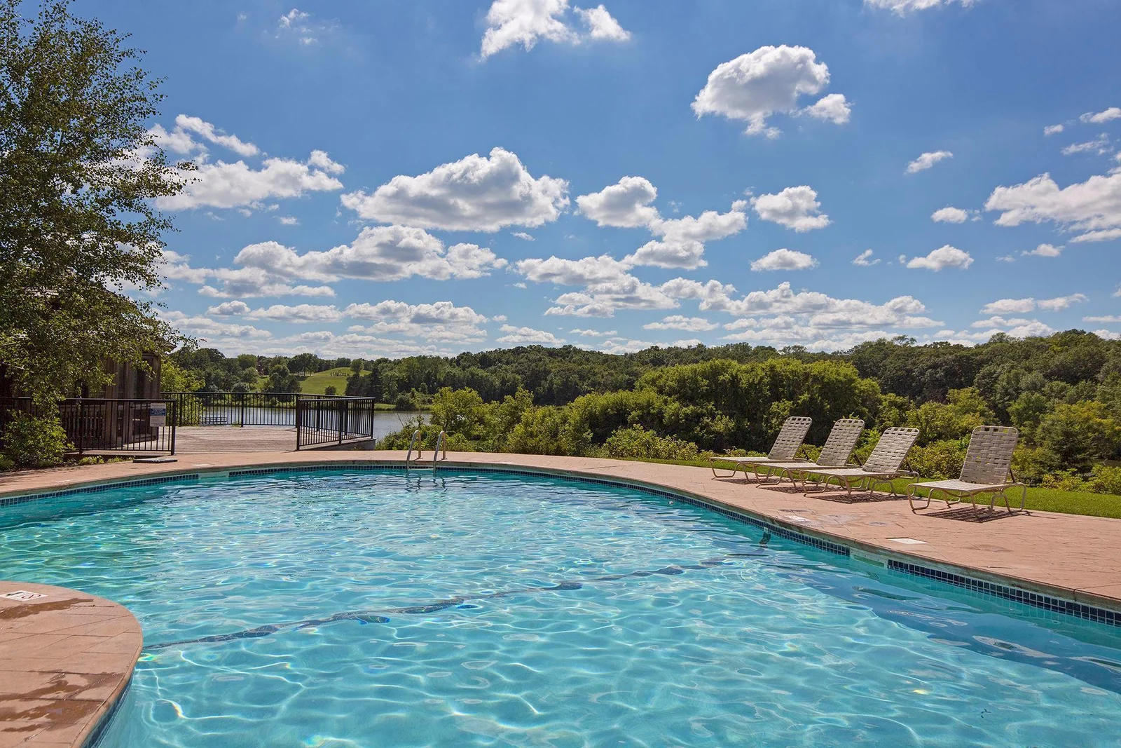 Outdoor pool with lake views