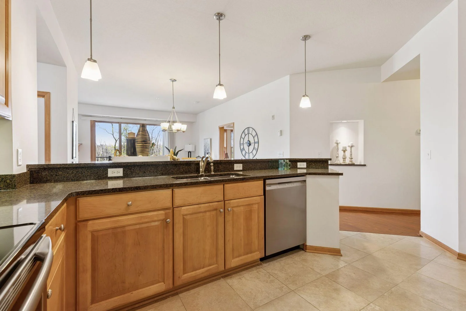 Views from the kitchen breakfast bar make this a wonderful place to prepare & enjoy meals.