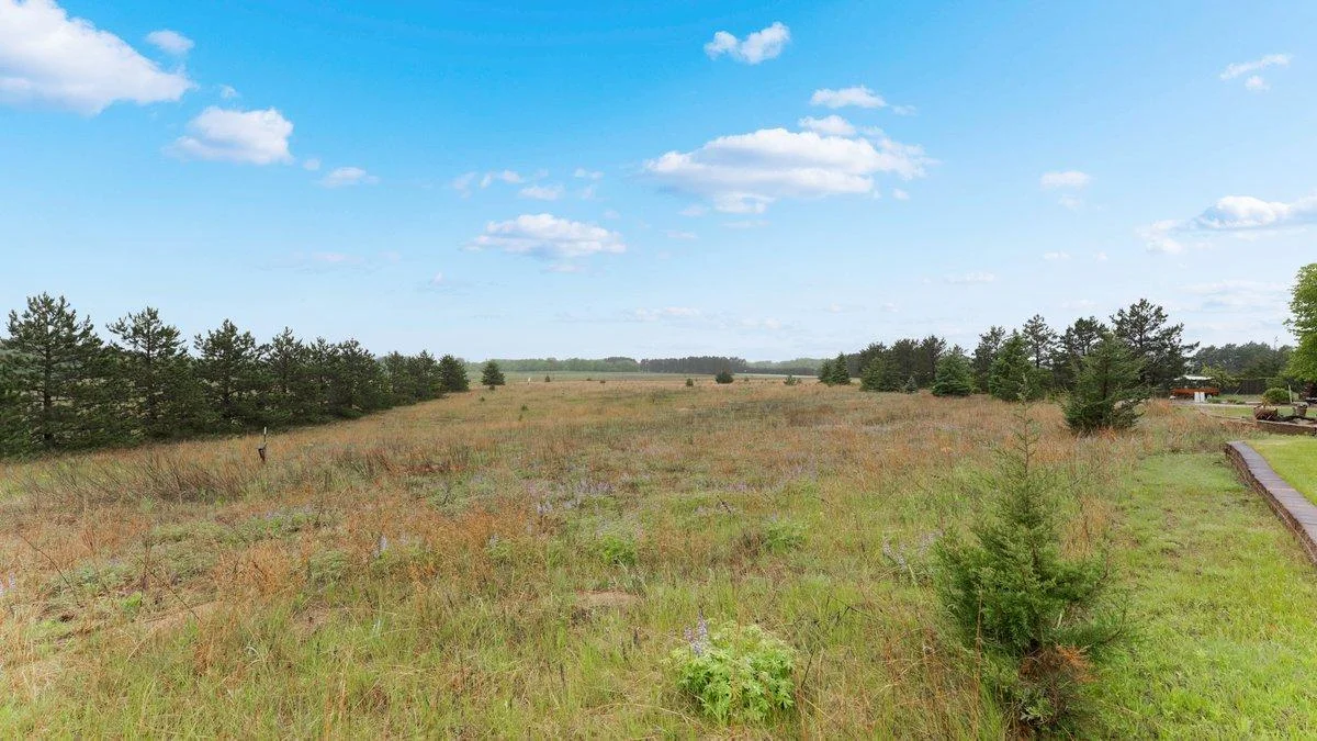 Expansive prairie landscapes blooming with lupine, native grasses, & seasonal wildflowers.