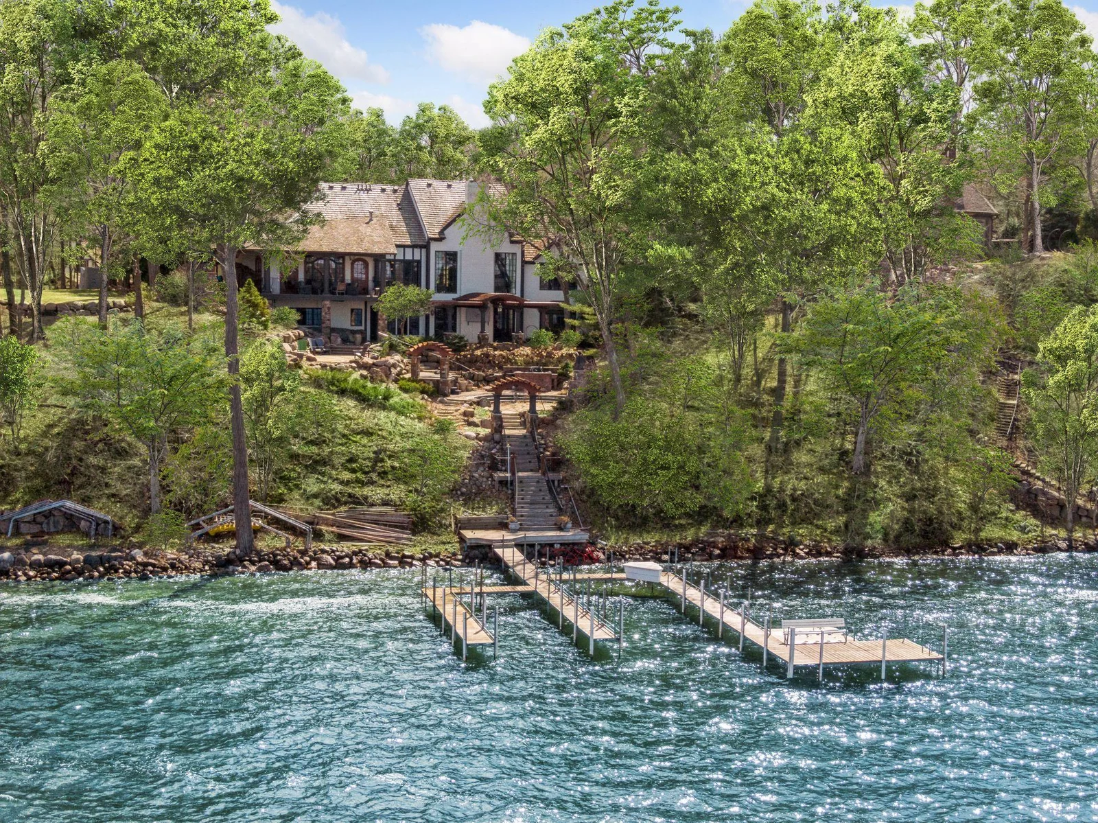 Multi-level entertainment areas including hot tub, outdoor kitchen and stunning views!
