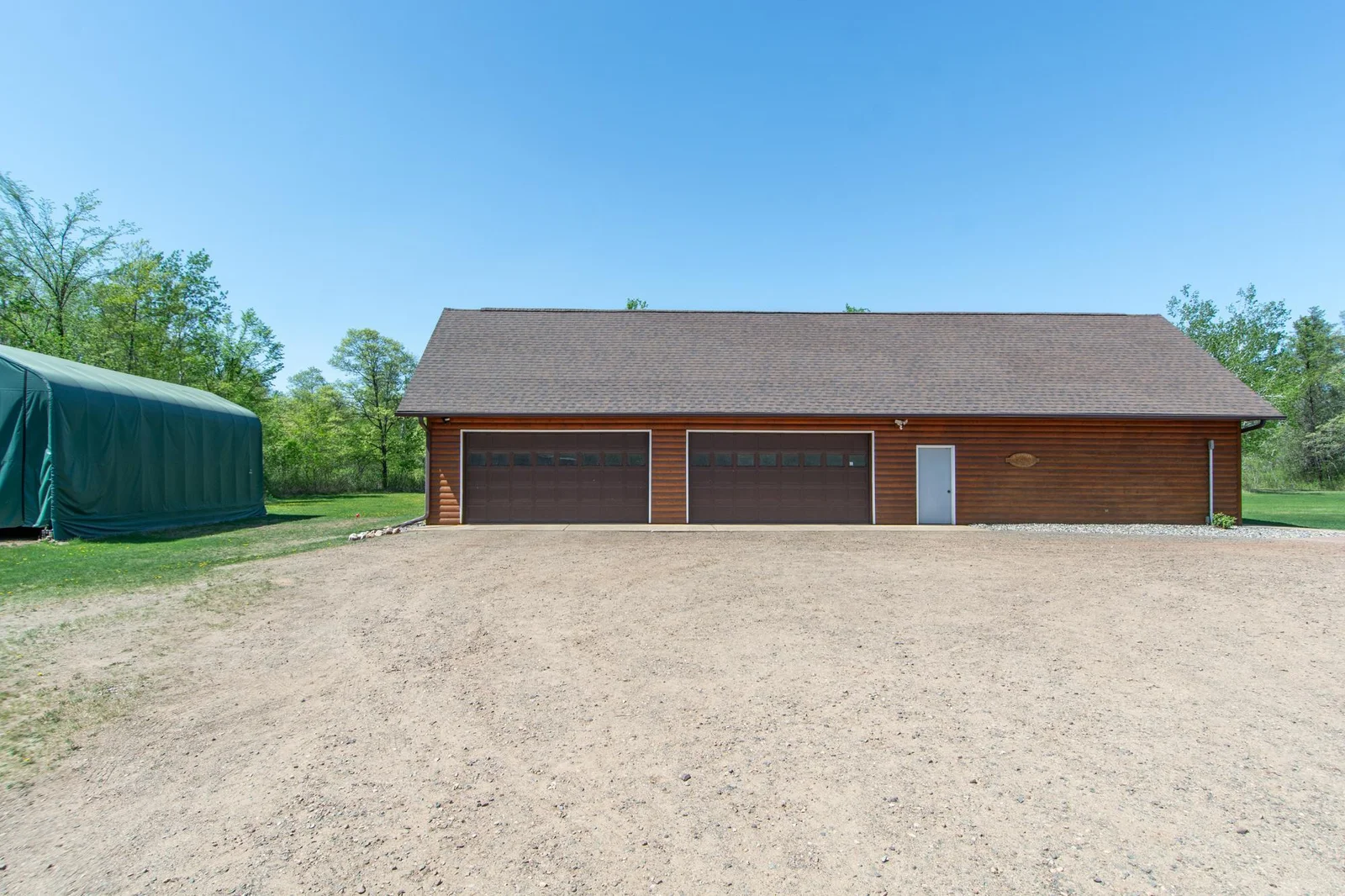 4 car garage with a heated workshop.