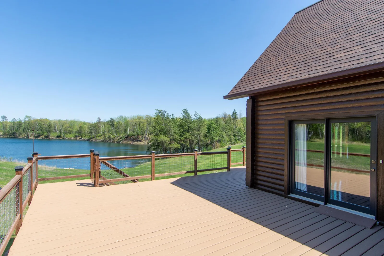 This portion of the deck is 17x24.5 ft. and overlooks the yard and mine pit lake.
