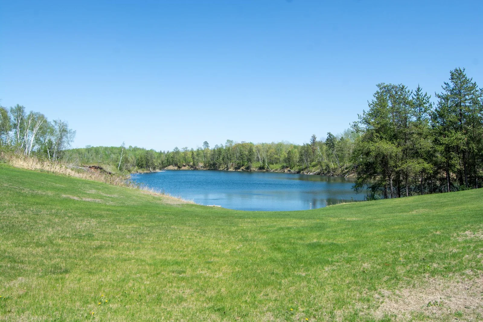 A view of the yard and mine pit lake.