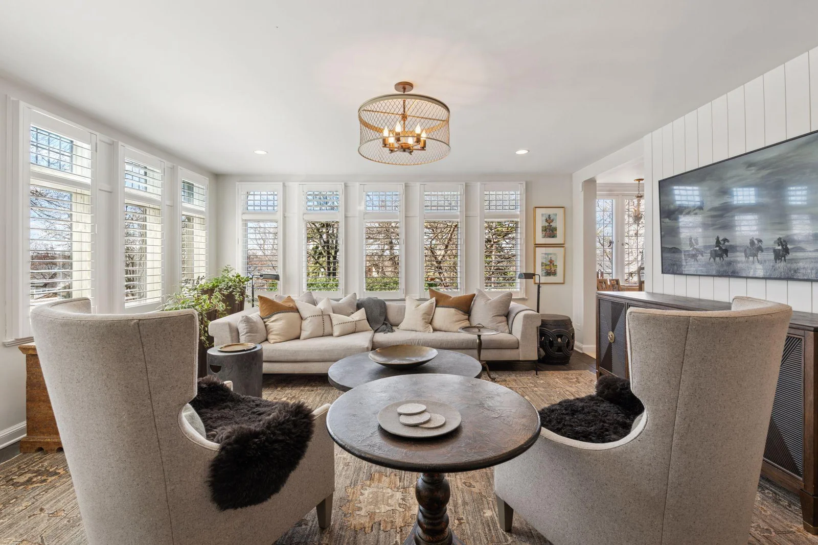 The inviting family room features seasonal views of Lake Harriet and sunset views year-round.  Abundant natural light, close proximity to the kitchen, and easy access to the patio and yard.