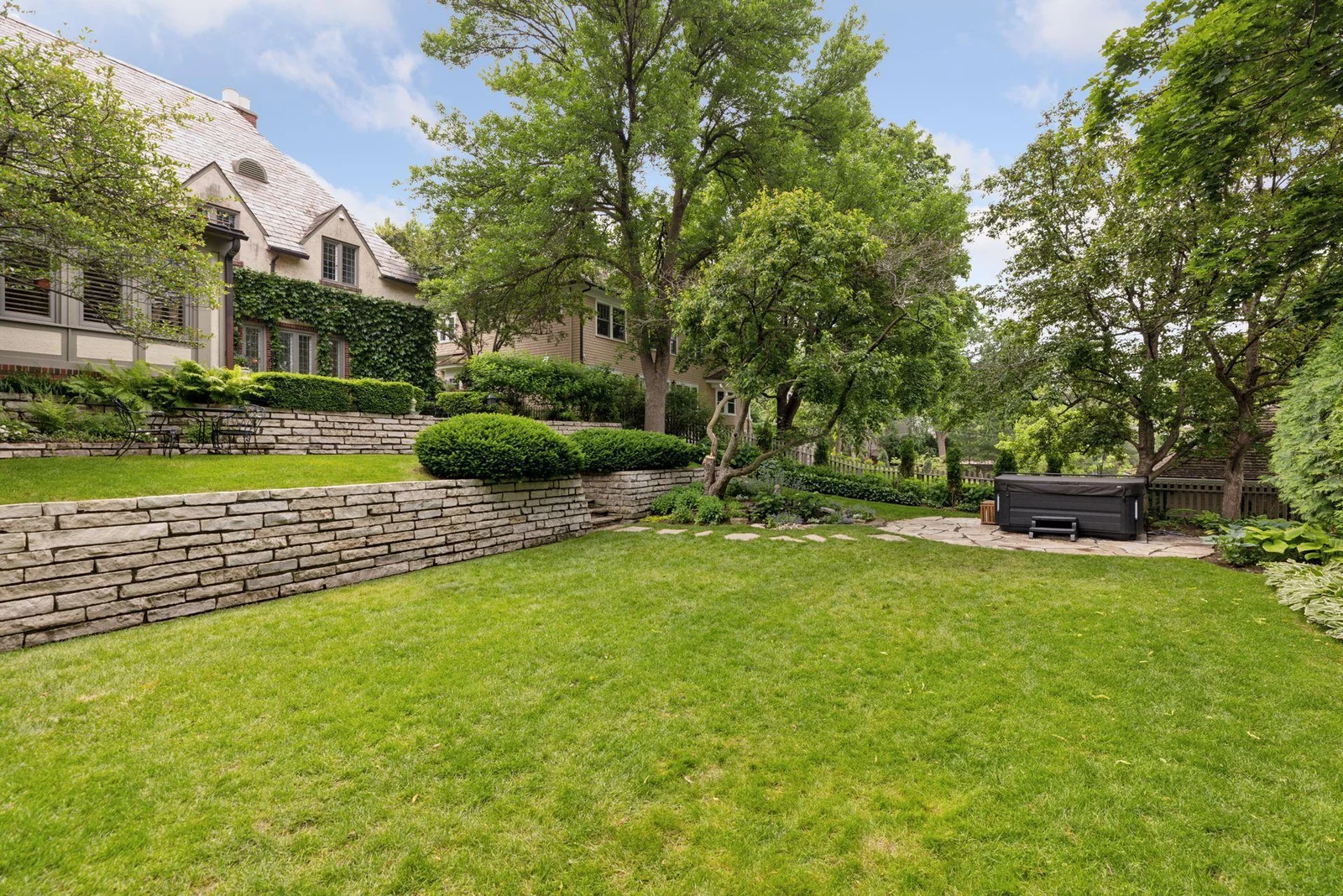 The expansive flat lawn invites a wide variety of activities and games.