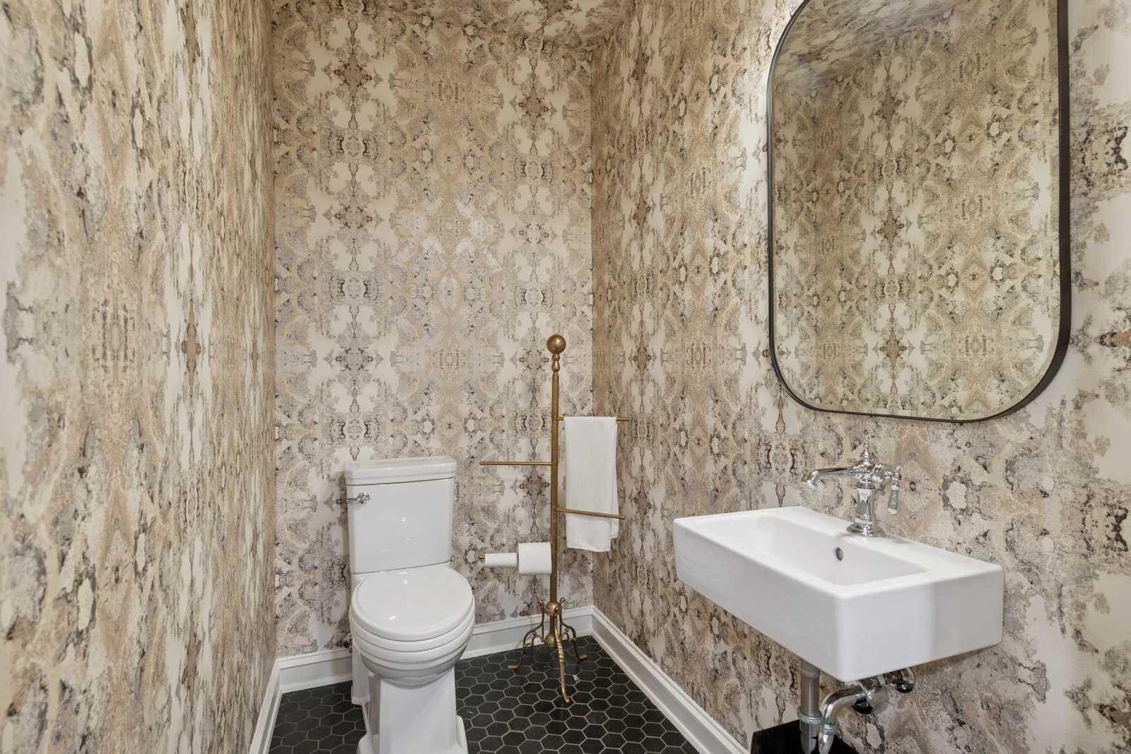 Lower level half bath with heated floors.
