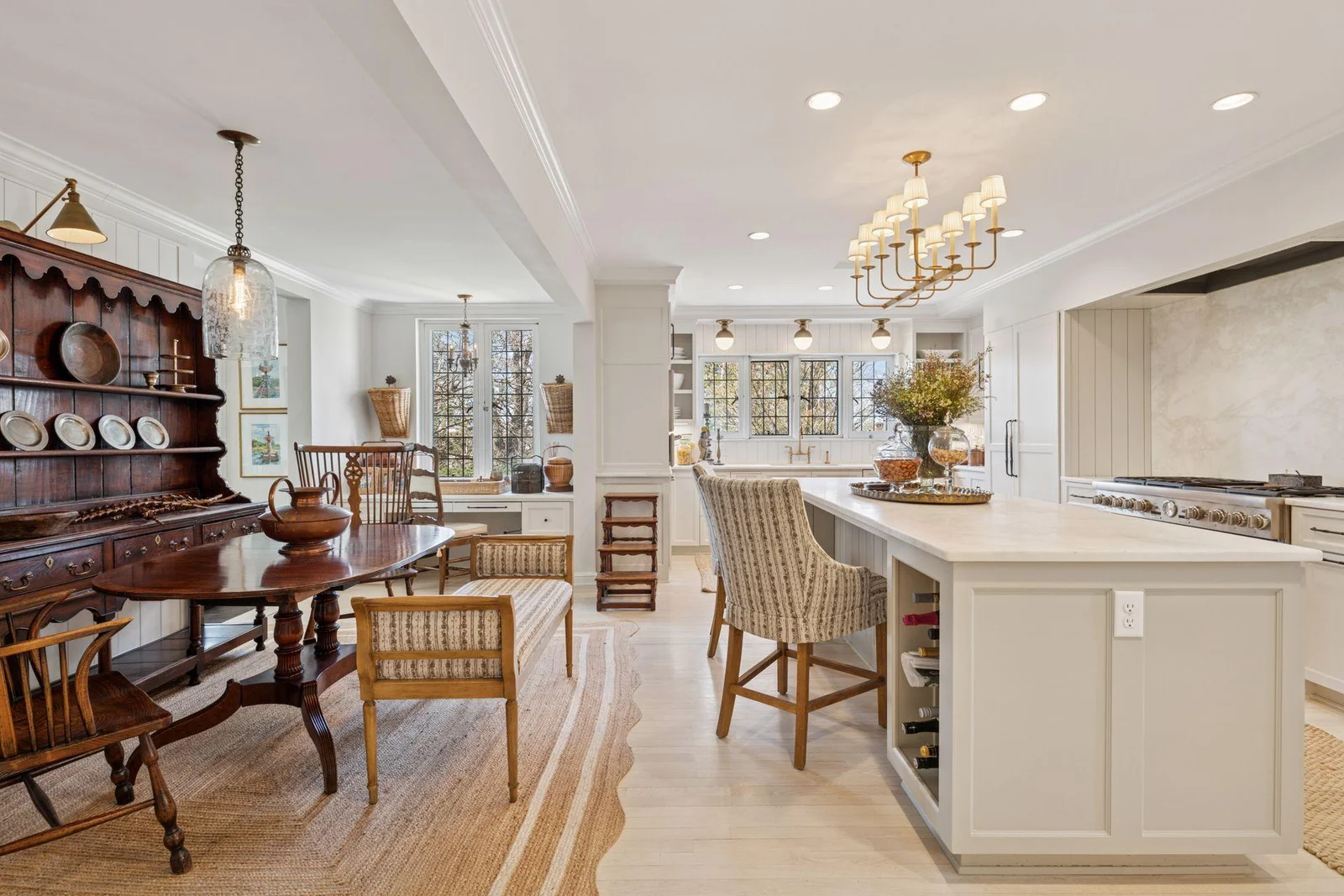 Spacious kitchen with informal dining and built-in desk area.