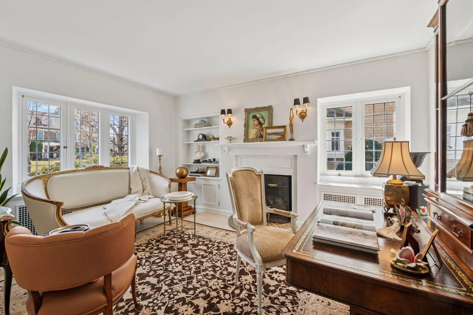 Main level office/den with gas log-set fireplace.  Southern and eastern exposure.