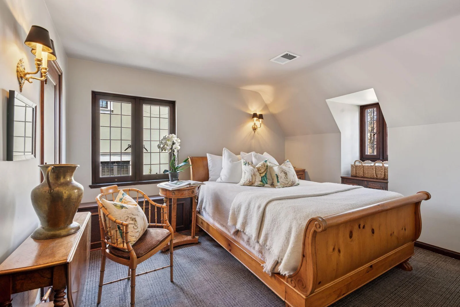 A separate hallway leads to a charming fourth bedroom.  Walk-in closet.