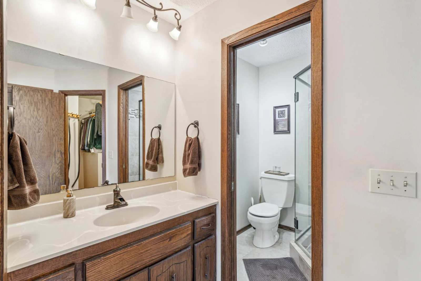 Private 3/4 owners suite bathroom with an elegant walk-in shower.