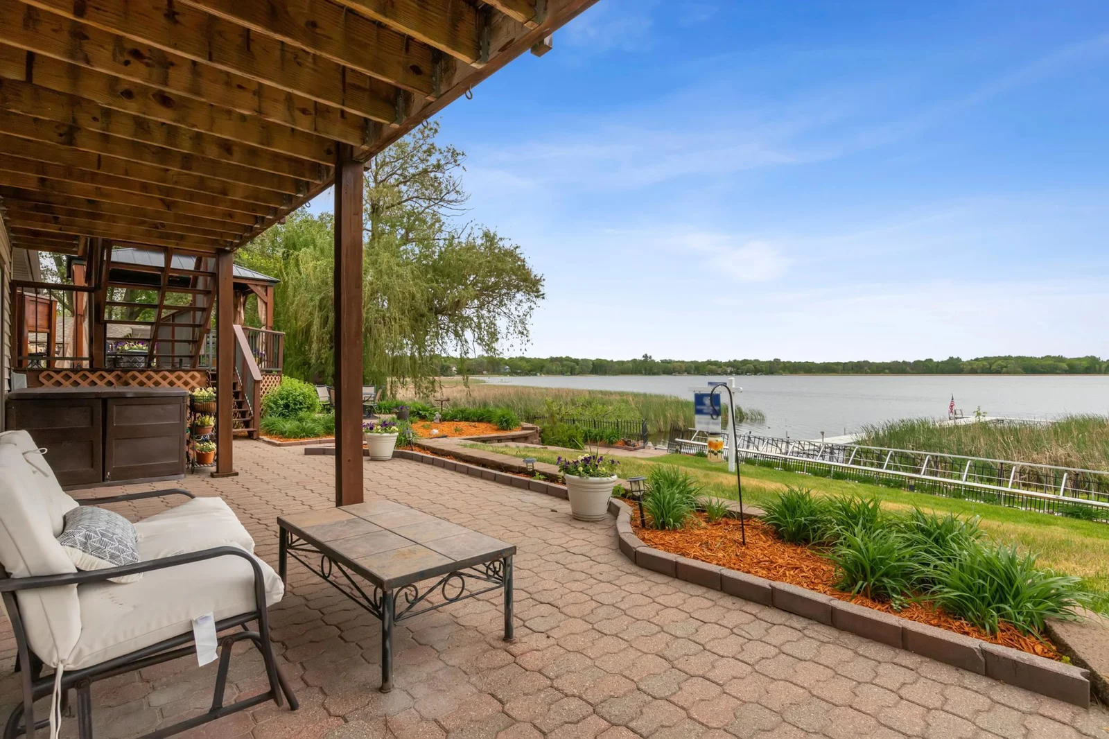 Expansive backyard patio with ample space for entertaining friends and famly