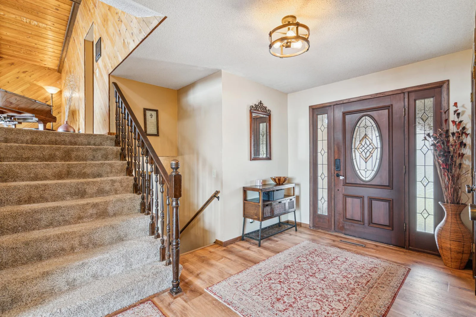 Welcoming main level foyer filled with natural light.