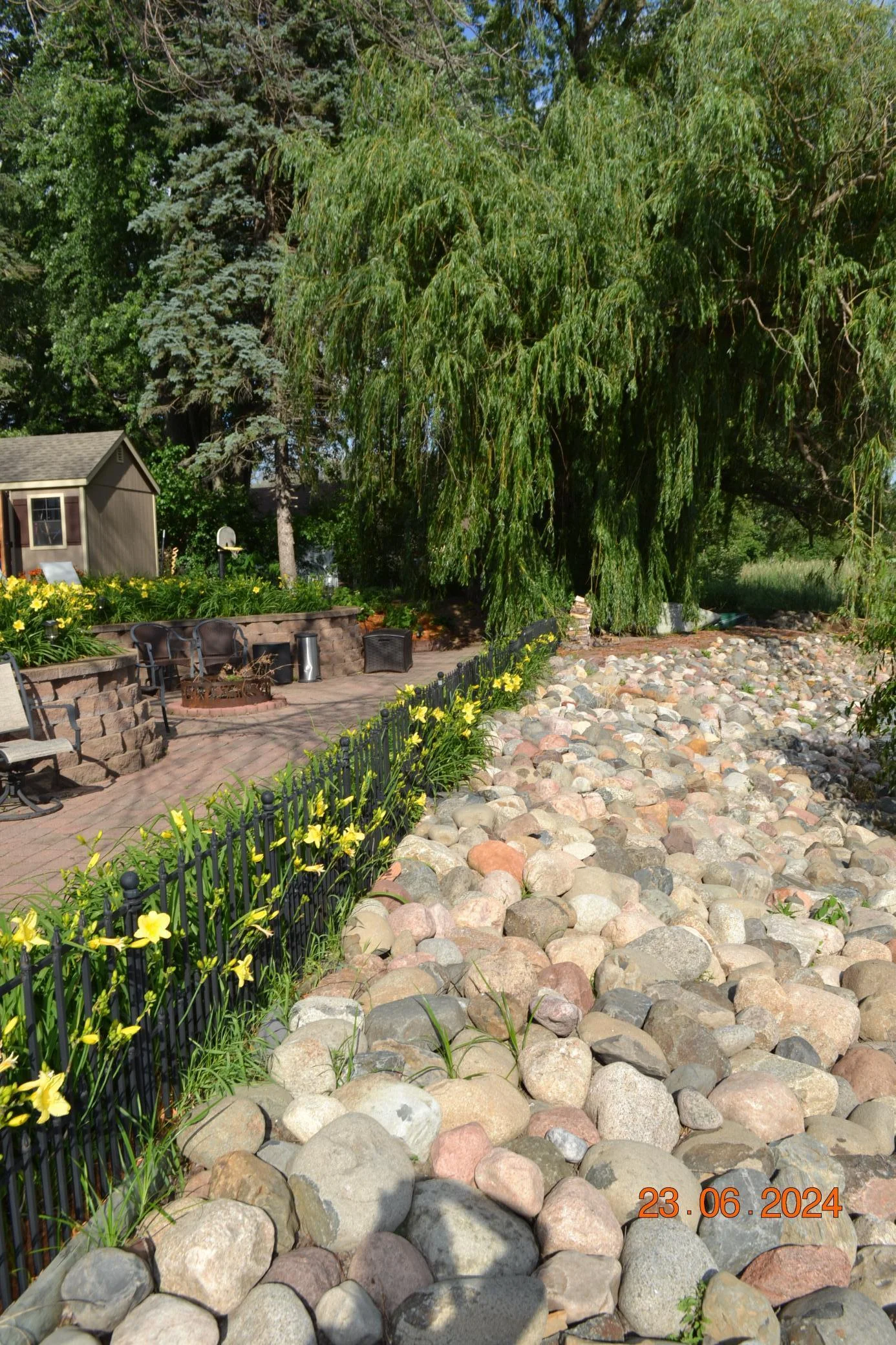 Rocky shoreline that is overlooked by the expansive patio