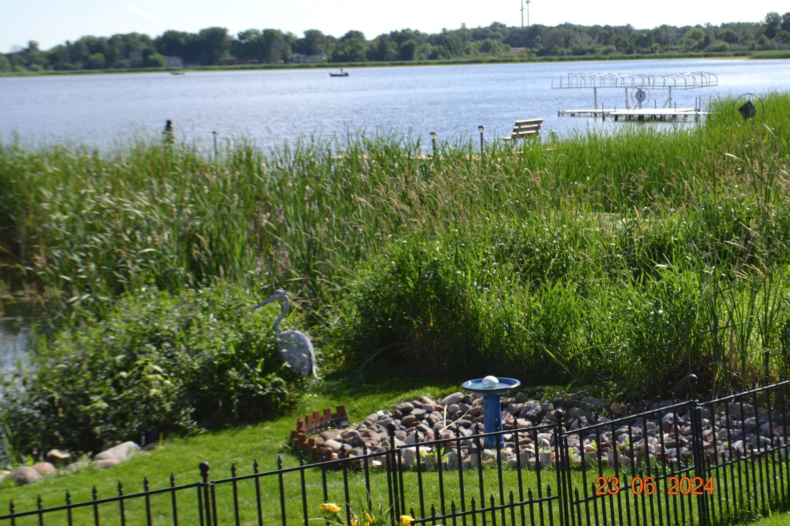 Well maintained garden beds overlooking Ham Lake