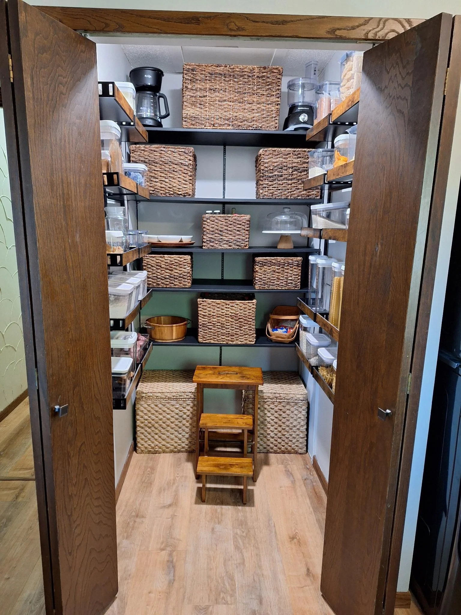 Spacious walk in pantry with ample storage