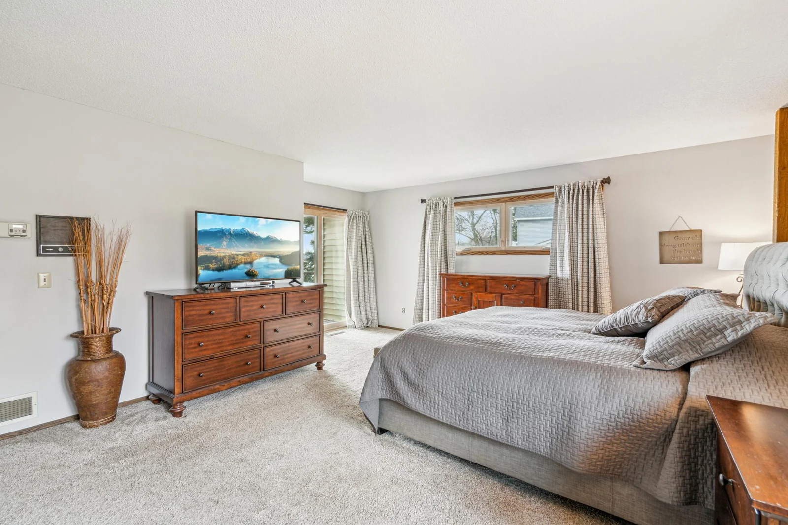 Large upper  level owners suite with private walk-out access to the deck