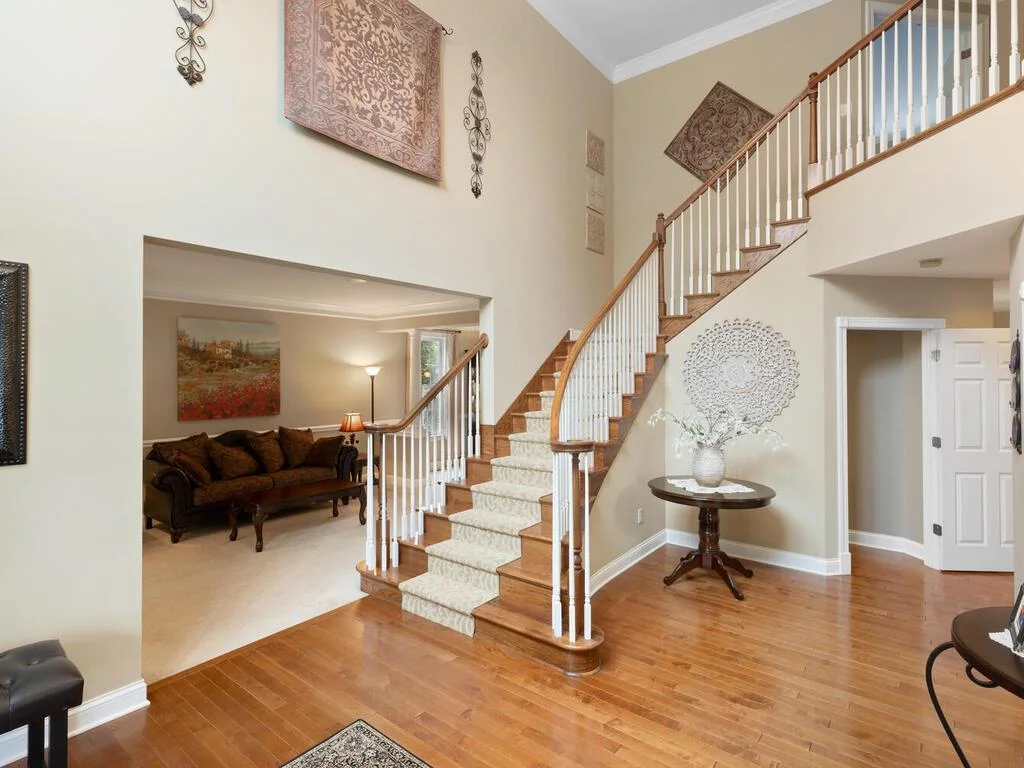One of two stairs to access the upper level 4 bedrooms.