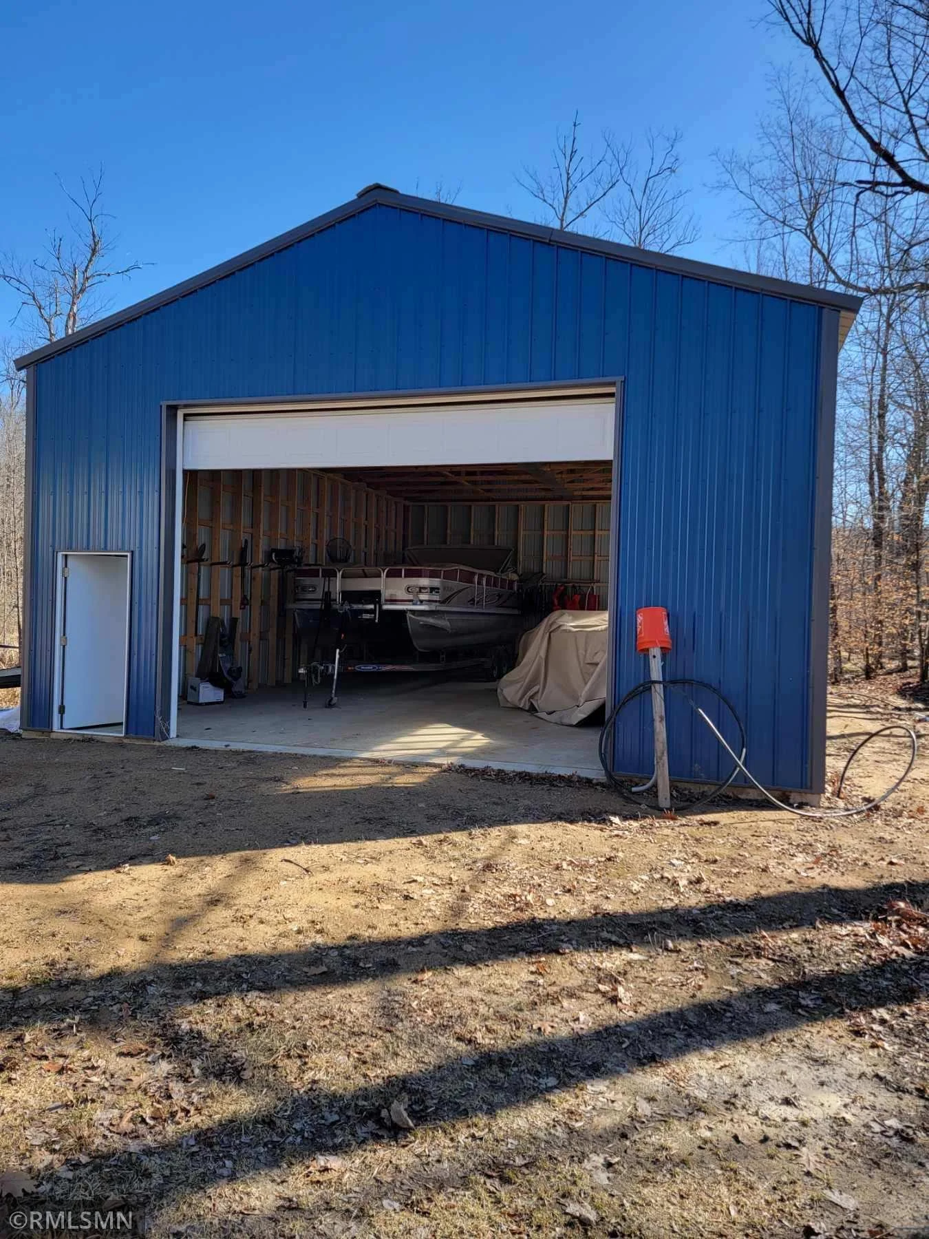 2022 Built 28x40 with concrete floor and electric to the building