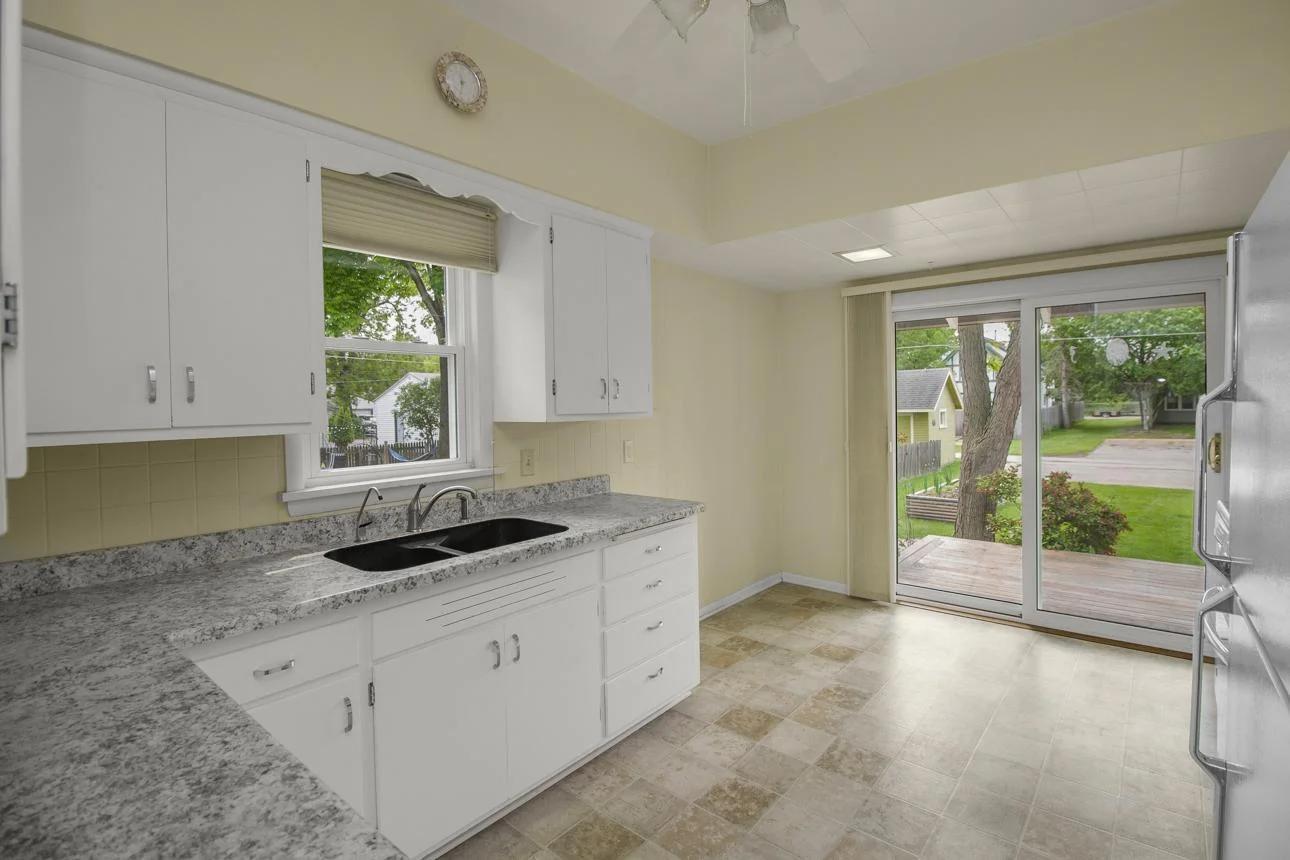 Kitchen with access to deck and patio