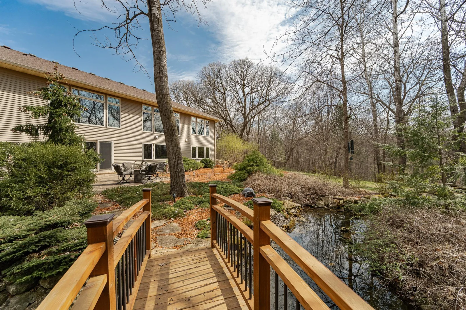 You'll love following the hiking trail that starts with this bridge over the water feature.