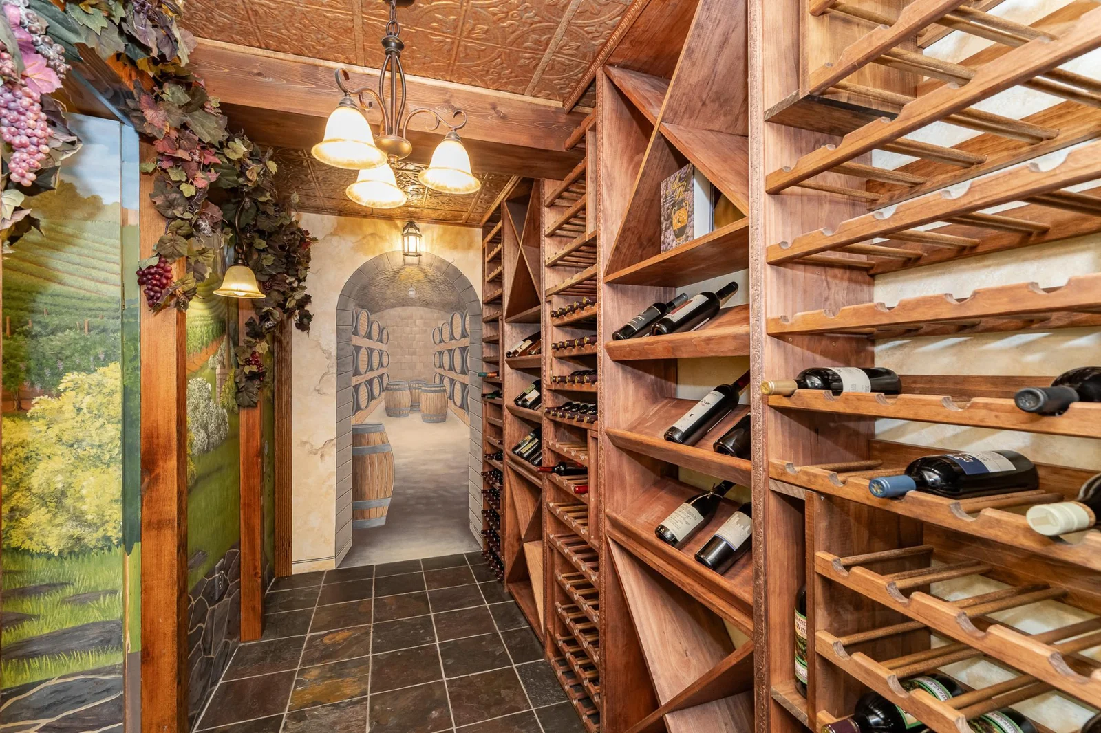 Plentiful wine storage. Don't miss the hidden door.