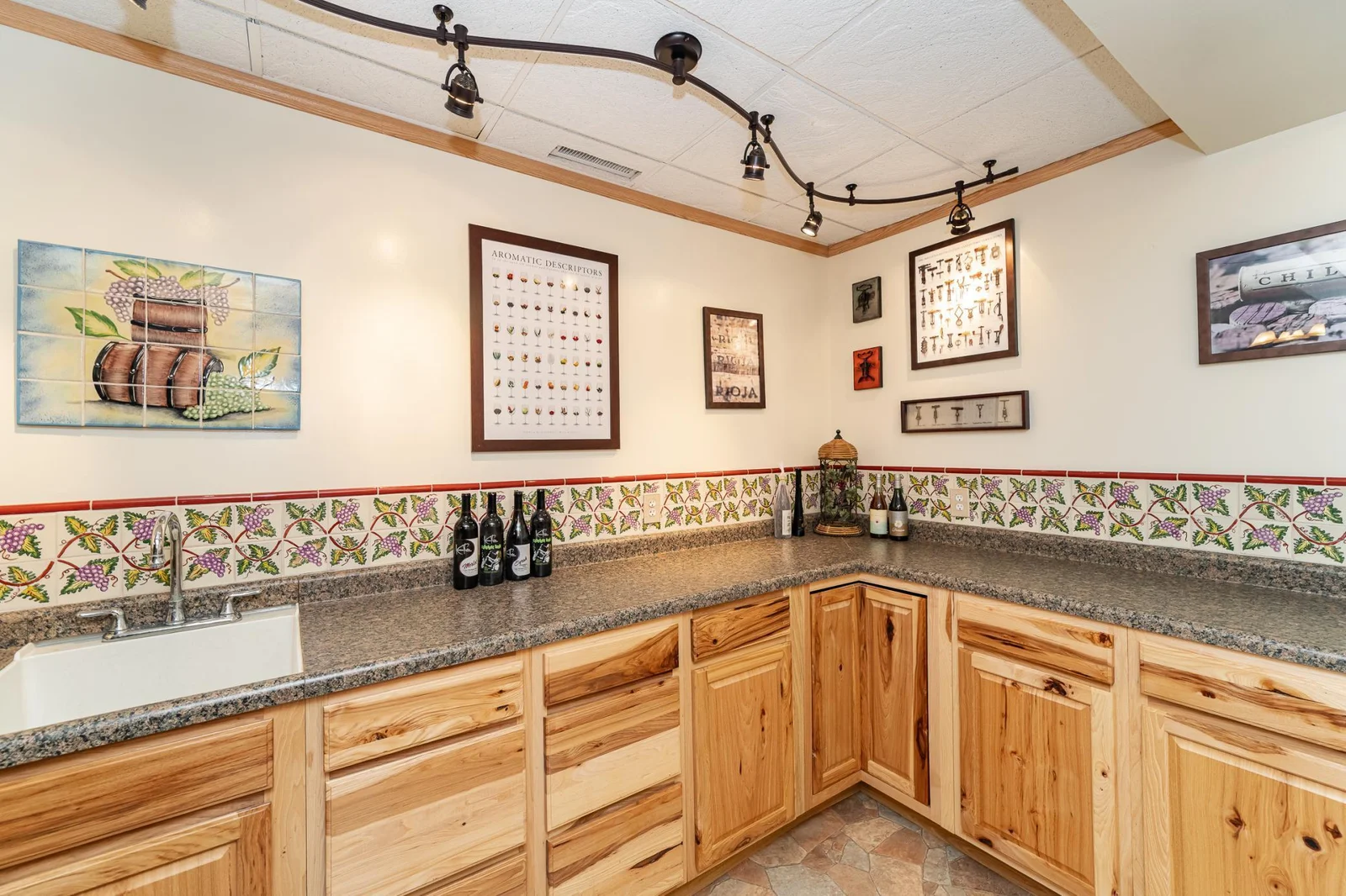 Wine making area. (Plumbed for additional bathroom and could be converted to make an ensuite to adjacent large bedroom.)