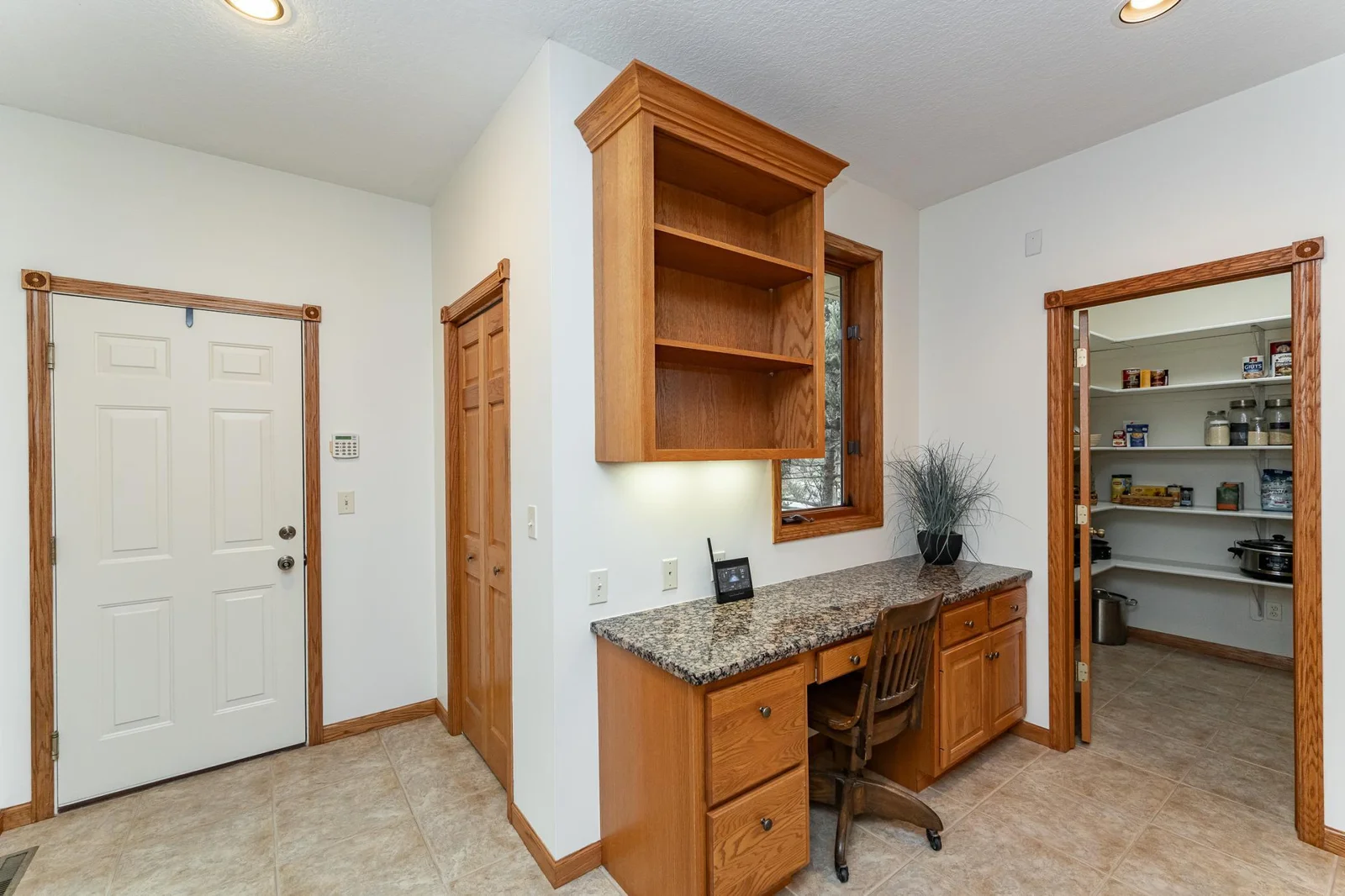 Meal planning and plentiful walk-in pantry off the kitchen.