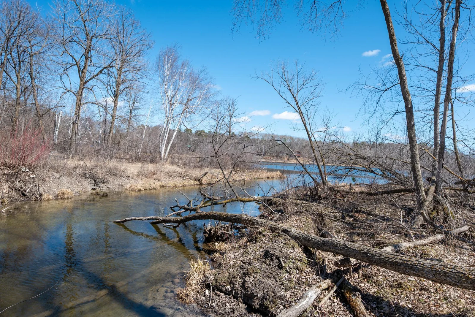 Over 300' of frontage on a tranquil winding creek on the Ossawinnamakee Chain!