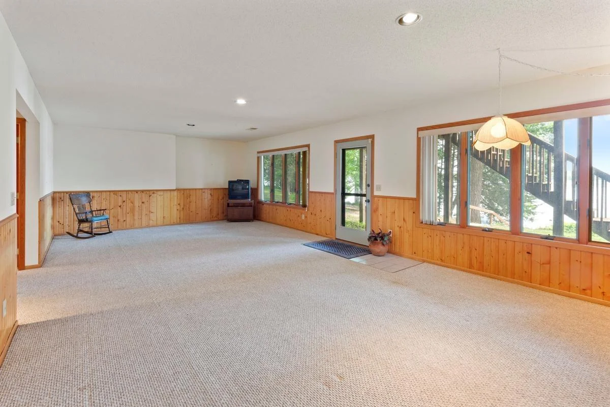 The spacious walk-out lower level provides endless possibilities for entertaining, relaxing, or hosting guests, while also offering plenty of room for additional sleeping space or a future bunk area.
