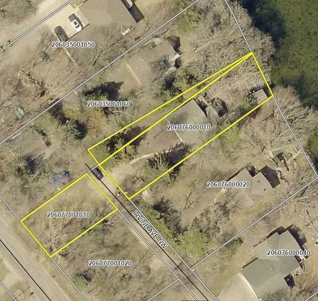 This unique offering includes three PID parcels combined to create a spacious half-acre lot!