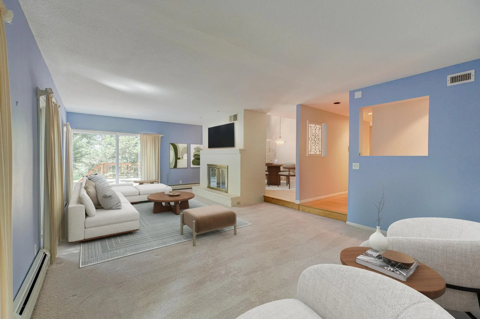 Inside, you’ll find multiple living areas with cozy wood-burning fireplaces, a formal dining room, and a spacious kitchen with generous storage. (virtually staged)