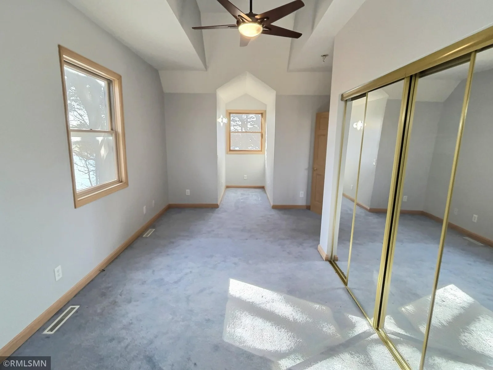 Here is one of the two upper level bedroom with plenty of windows for natural light and views.  Both bedrooms have two dormers for additional space to let your imagination run wild.