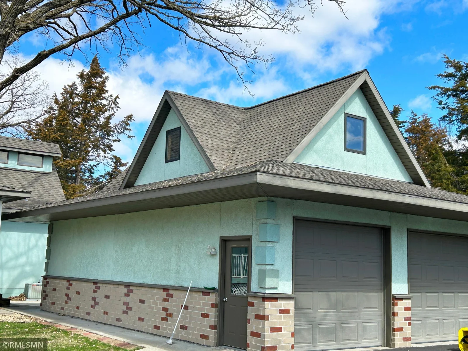 This is a great oversized garage with insulation and heat.